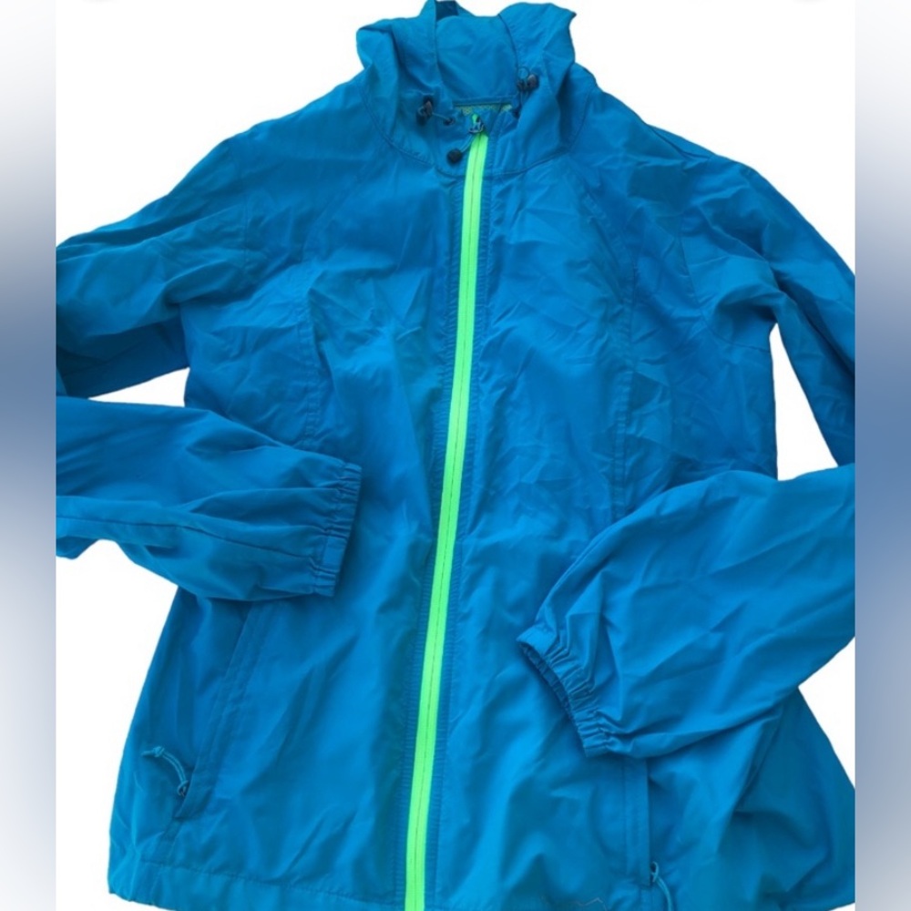 Eddie Bauer neon wind breaker. Women’s size small. Zip-up hooded wind breaker